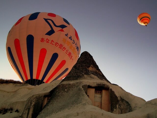 HOT AIR BALLOONS GOREME VILLAGE CAPPADOCIA CENTRAL TURKEY OCT 2011 (6363051805) Hot-air balloons rising over the fairy chimneys of Göreme at sunrise