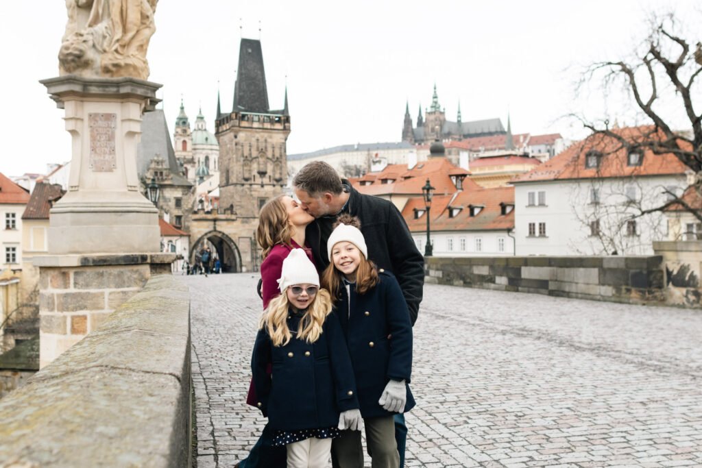 Family photoshoot on Charles Bridge in Prague